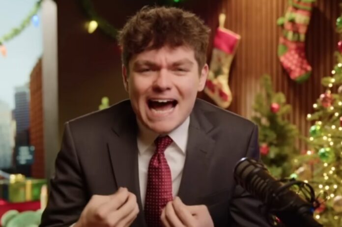 Nick Fuentes speaking angrily into a microphone during an online broadcast, with Christmas decorations visible in the background.
